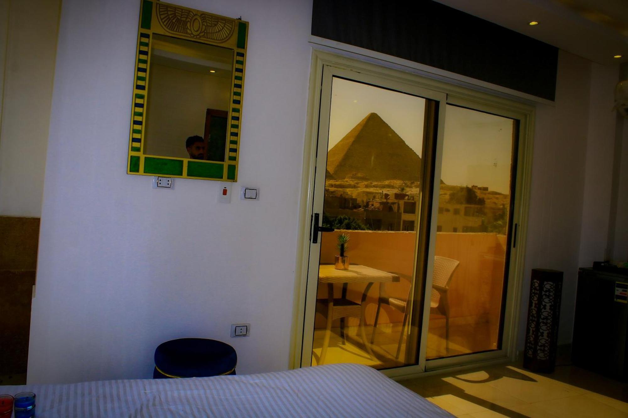 Pyramids Homeland Inn Каир Номер фото